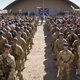 British troops and service personal remaining in Afghanistan are joined by International Security Assistance Force (ISAF) personnel and civilians as they gather for a Remembrance Sunday service at Kandahar Airfield November 9, 2014 in Kandahar, Afghanistan.